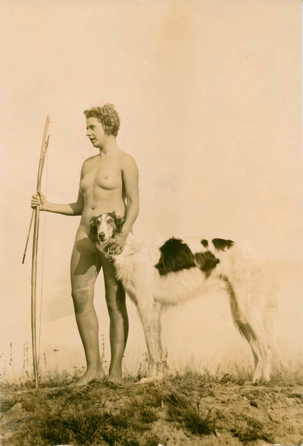 Young-Nude-Woman-with-Bow-and-Borzoi-Dog-by-Gerhard Riebicke-1928
